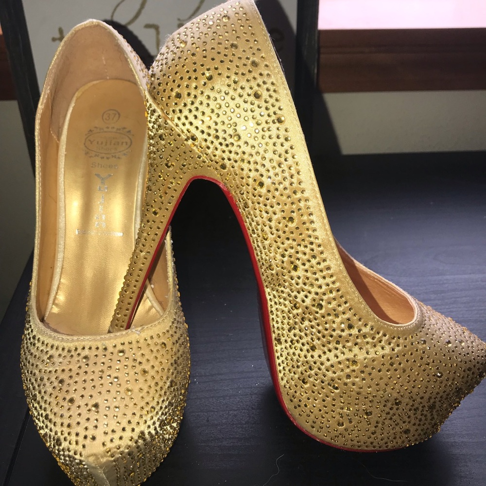 Gold gem covered stilettos